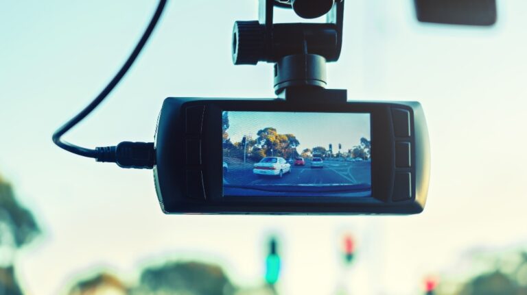 Dashboard camera in action installed on car windscreen